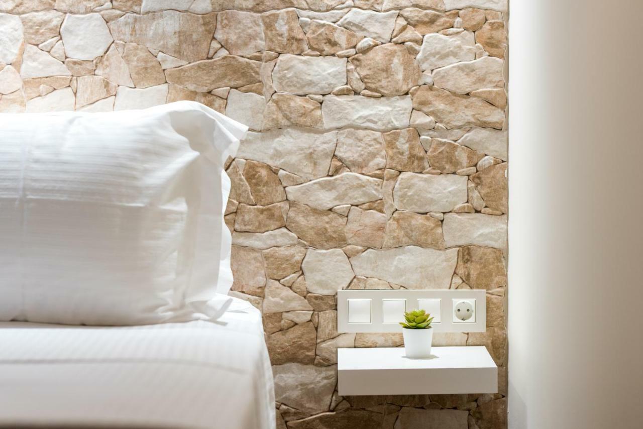 Oinoelia Luxury Suites & Residence Potos Bagian luar foto